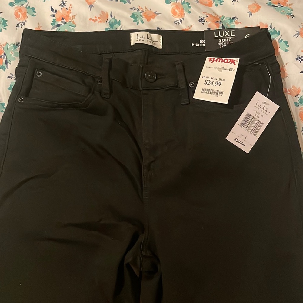 Brand new high rise skinny black jeans. Size 6 stretch